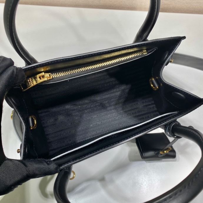 Pra*a top handle bags